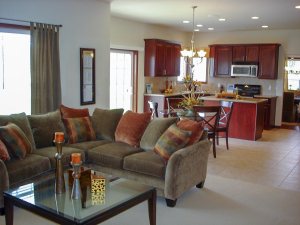 Open concept living to dining to kitchen