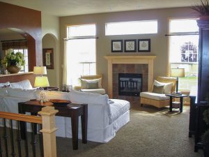 Living room with fireplace and natural light