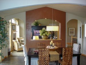 Dining room with divider wall looking into living room